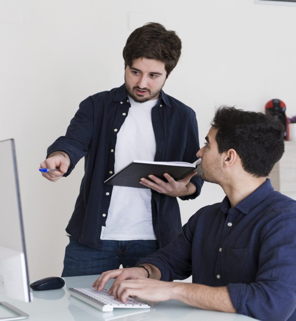 Team collaborating in a consultative design process for wellness brand development.