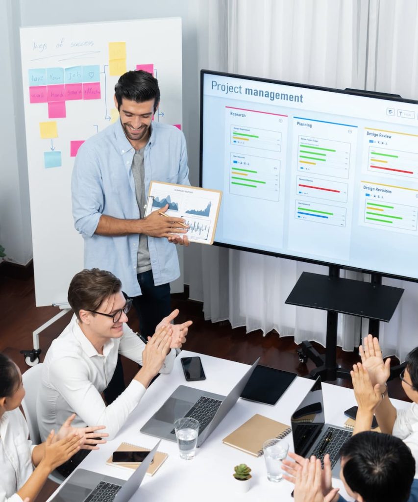 Fitness brand go-to-market strategy with planning charts and team collaboration Title: Go-to-Market Planning for Fitness Brands